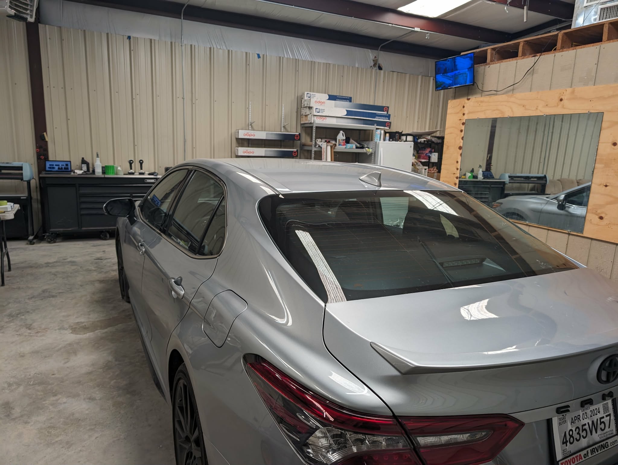 Toyota Camry rear windshield with older tint before rework